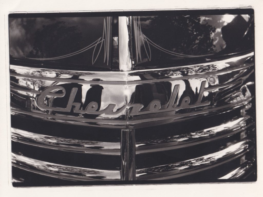 B&W film image of a chevy grill